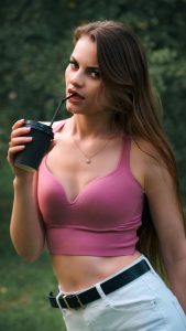 Read more about the article Terrace Flash: Topless Tease Ignites Swinger’s Shift